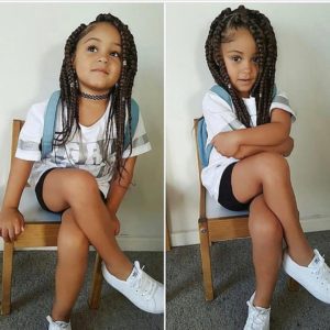 Little girl with jumbo box braids and laid edges
