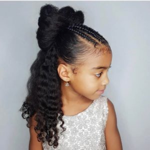 Cute little girl with a half u half down updo, and little cornrows in front.