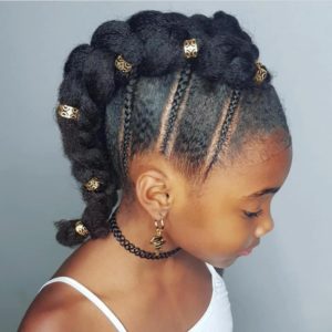 Little black girl with braided Mohawk updo with gold accessories