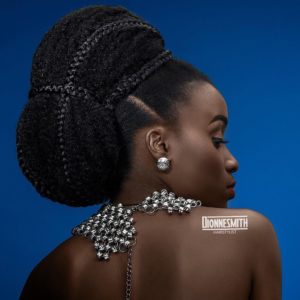 avant garde wedding hairstyle, braided bun on natural hair