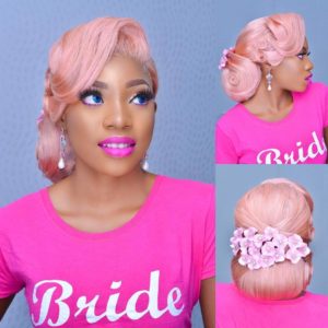 colorful pink wedding hairstyle with flower wedding hair accessories