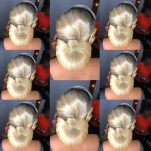 Elegant blonde twisted low bun wedding hairstyle