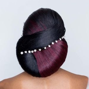 two-tone sleek low bun hairstyle with wedding hair pins