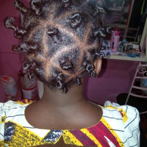back view of bantu knots style on black woman