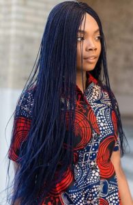 black woman wearing long black twists microbraids box braid styles
