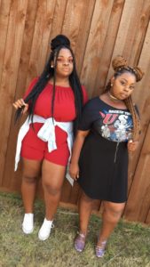 two black girls wearing box braid styles, one black one brown