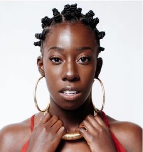 beautiful black woman with small bantu knots hairstyle