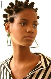 beautiful black woman with hair in bantu knot style