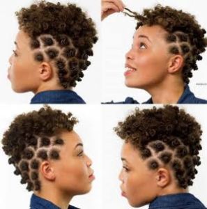 Black woman with little bantu knots on the side, and bantu knot out on top