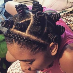 Woman with blackbantu knots with cornrow in front