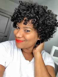 Black woman with beautiful curls from bantu knot out