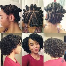 woman with flat twists with baantu knots at the end, resulting in gorgeous twist-out