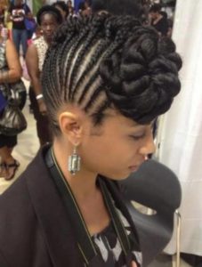 creative cornrows with mowhawk and a twisted bun in front