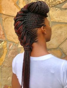 black girl wearing Twisted Mohawk pattern with a ponytail, braided hairstyles for black hair