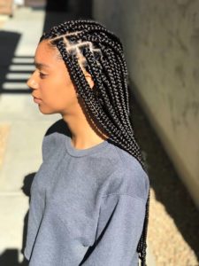 black girl wearing neat and nice box braids