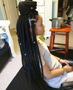 girl with box braids and gold accessories, black braided hairstyles