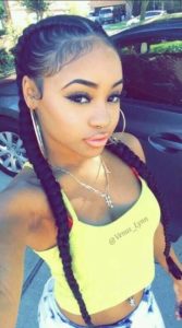 black girl wearing cute pigtail braids