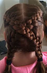 little girl wearing criss cross french braids