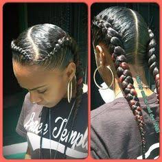 black girl wearing two feed-in french braids