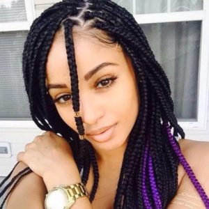 light-skinned woman with black box braids with purple highlights, black braided hairstyles