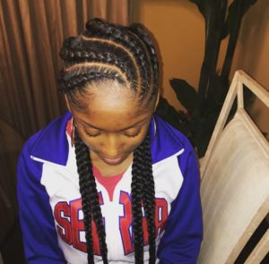 black girl in cute curvy feed-in braids