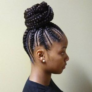pretty little black girls with feed in braids swept up in a bun