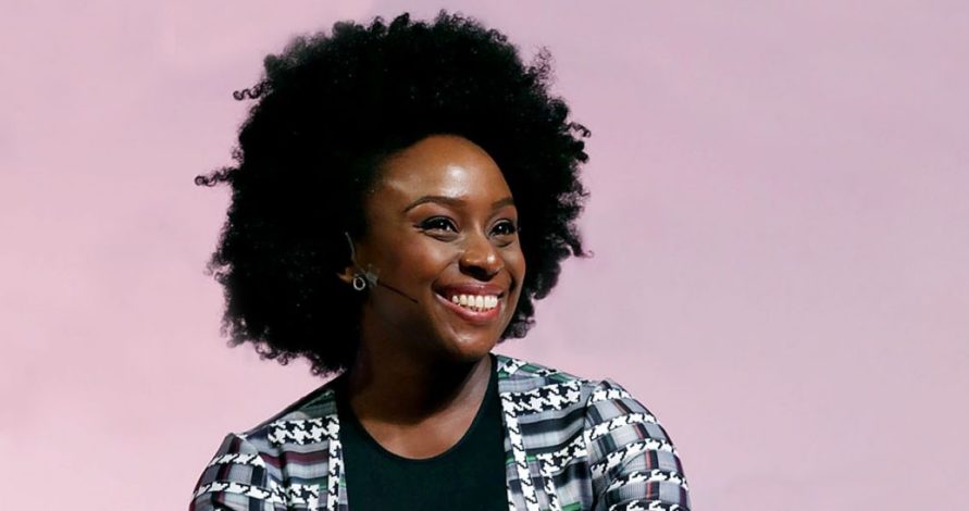 Chimamanda on afro and monochrome jacket