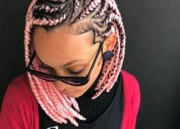 Box Braid Styles: 30 Ideas For Your Next Box Braids Hairstyle woman wearing pink chunky bob box braids